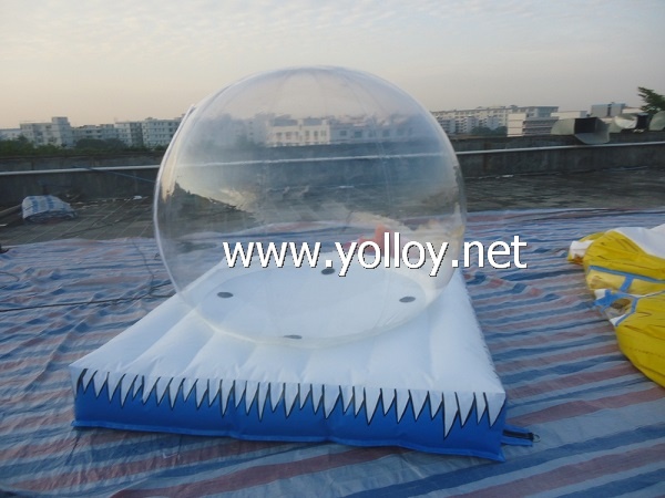 Inflatable snow globe with air bouncy mat