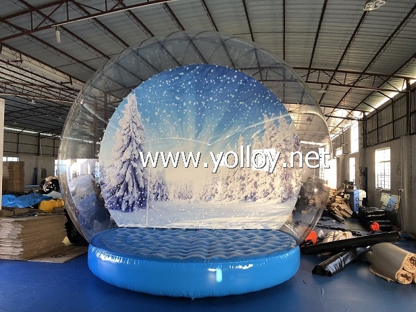 Inflatable christmas snow globe