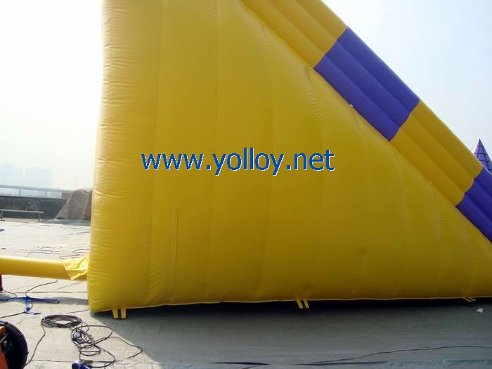 yellow Disney world inflatable castle slide