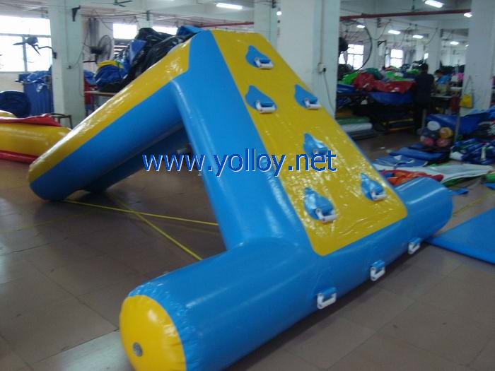 Inflatable water slide floating on water