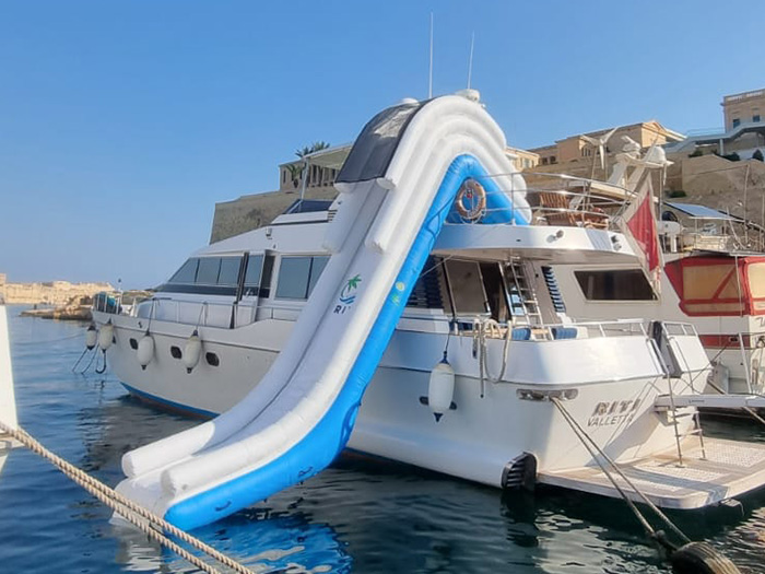 Inflatable dock slide for boat yacht